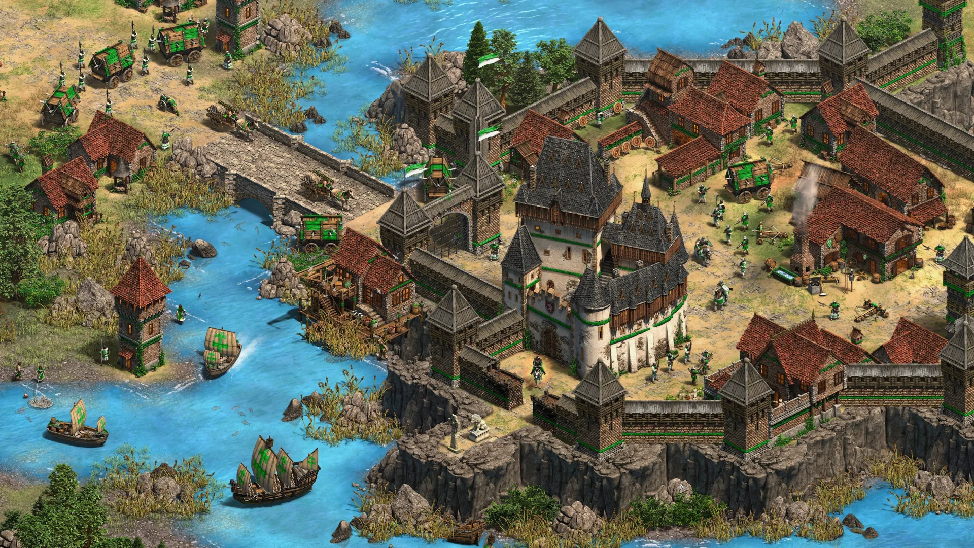 Captura Age Of Empires II Definitive Edition – Ciudad Fortificada Junto A Un Rio Con Tejados Rojos Castillo Central Y Barcos En El Agua
