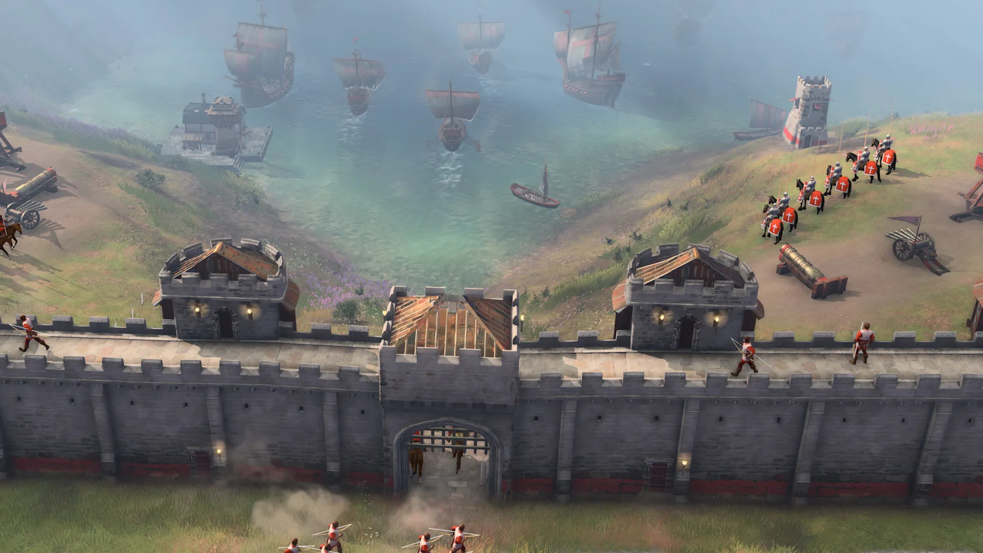 Captura Age Of Empires IV Anniversary Edition – Muro De Defensa Con Tropas Y Canones Mientras Barcos Navegan En El Mar Bajo Neblina