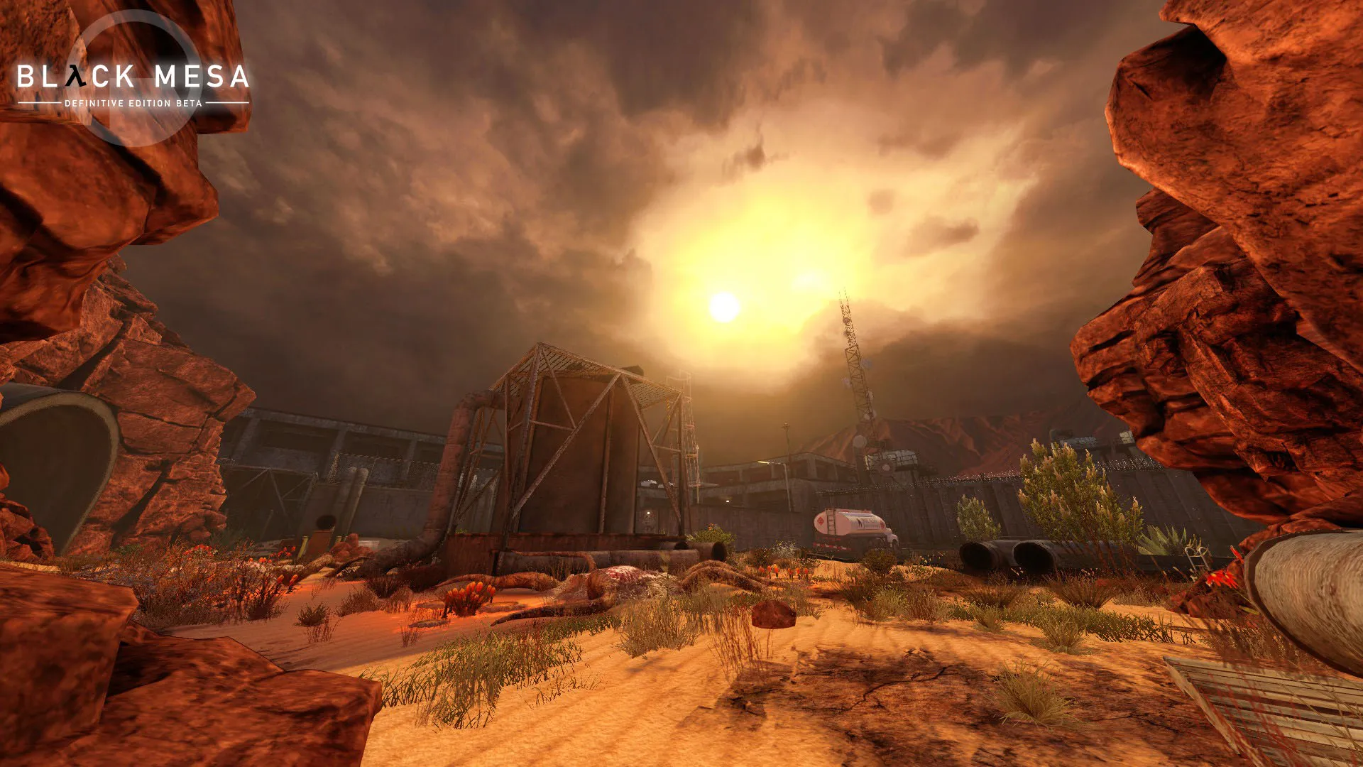 Captura Black Mesa Paisaje Desertico Con Estructuras Y El Sol Bajo En El Horizonte