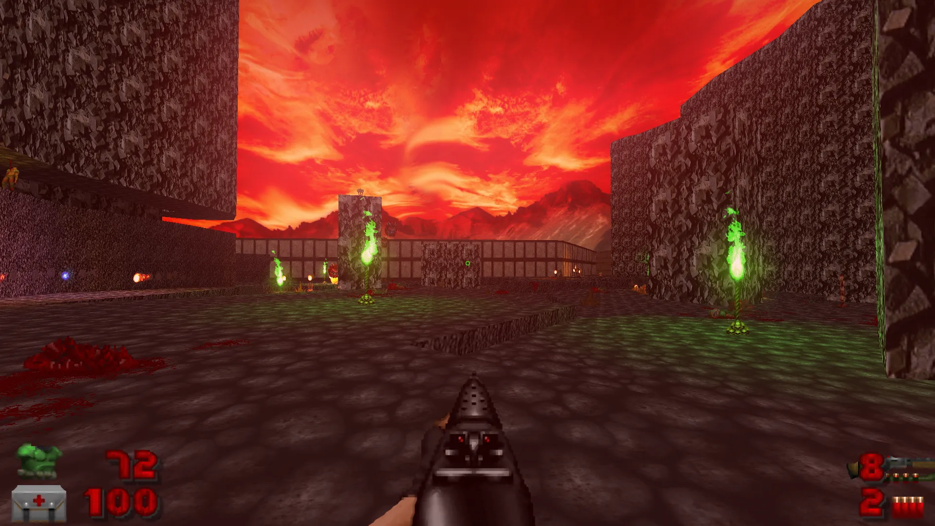 Captura DOOM II – Escenario Infernal Con Cielo Rojo Estructuras Elevadas Y Llamas Verdes Iluminando El Entorno