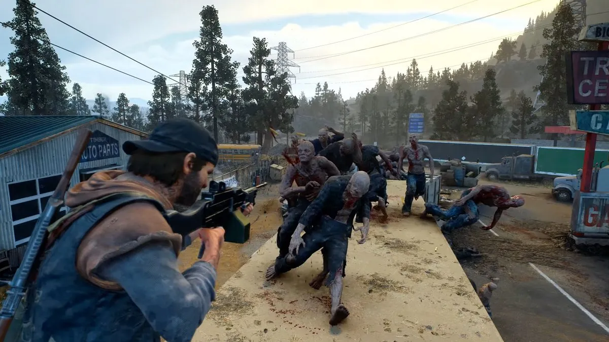 Captura Days Gone Remastered – El Protagonista Dispara Desde El Techo De Un Autobus Mientras Una Horda De Infectados Lo Rodea