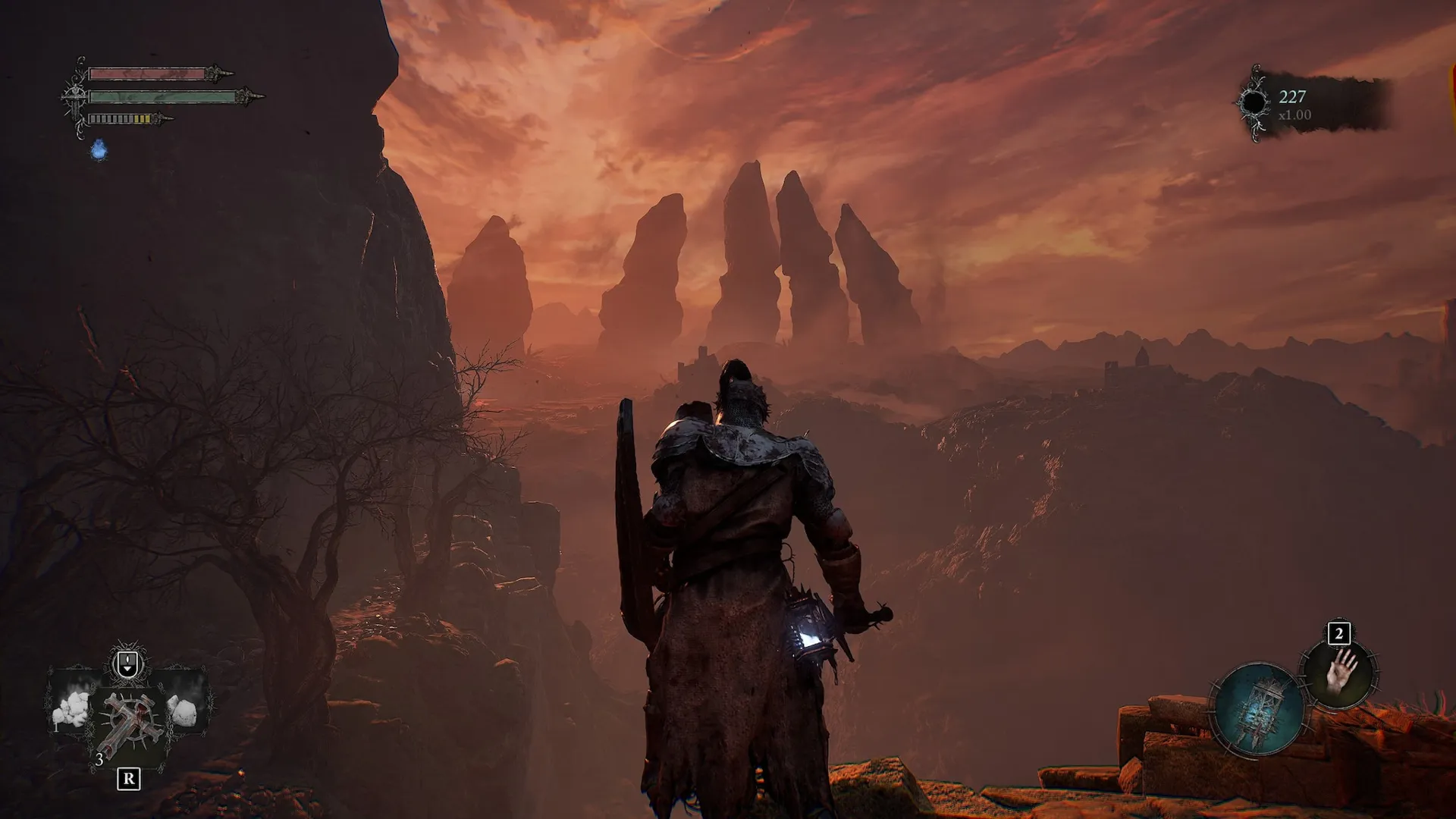 Captura Lords Of The Fallen – Aventurero Observa Un Paisaje Rocoso Al Atardecer Con Cinco Monolitos Al Fondo