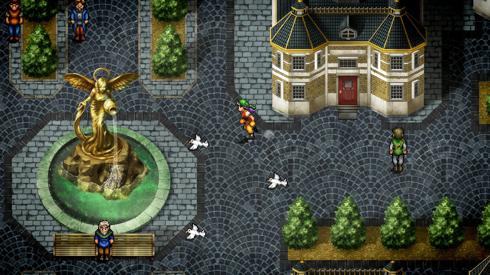 Captura Suikoden I II HD Remaster – Personaje Caminando Por Una Plaza Adoquinada Junto A Una Fuente Dorada