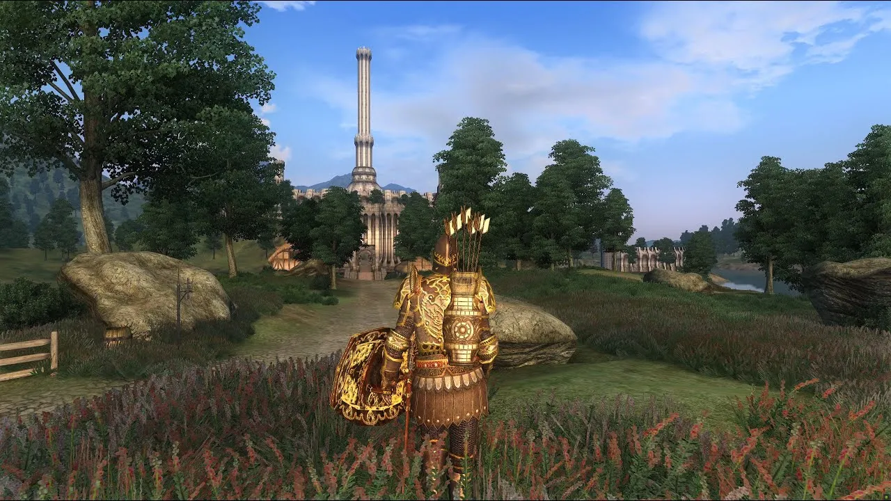 Captura The Elder Scrolls IV Oblivion Remastered Deluxe Edition – El Protagonista Con Armadura Dorada Observa Una Torre Desde Un Campo Abierto