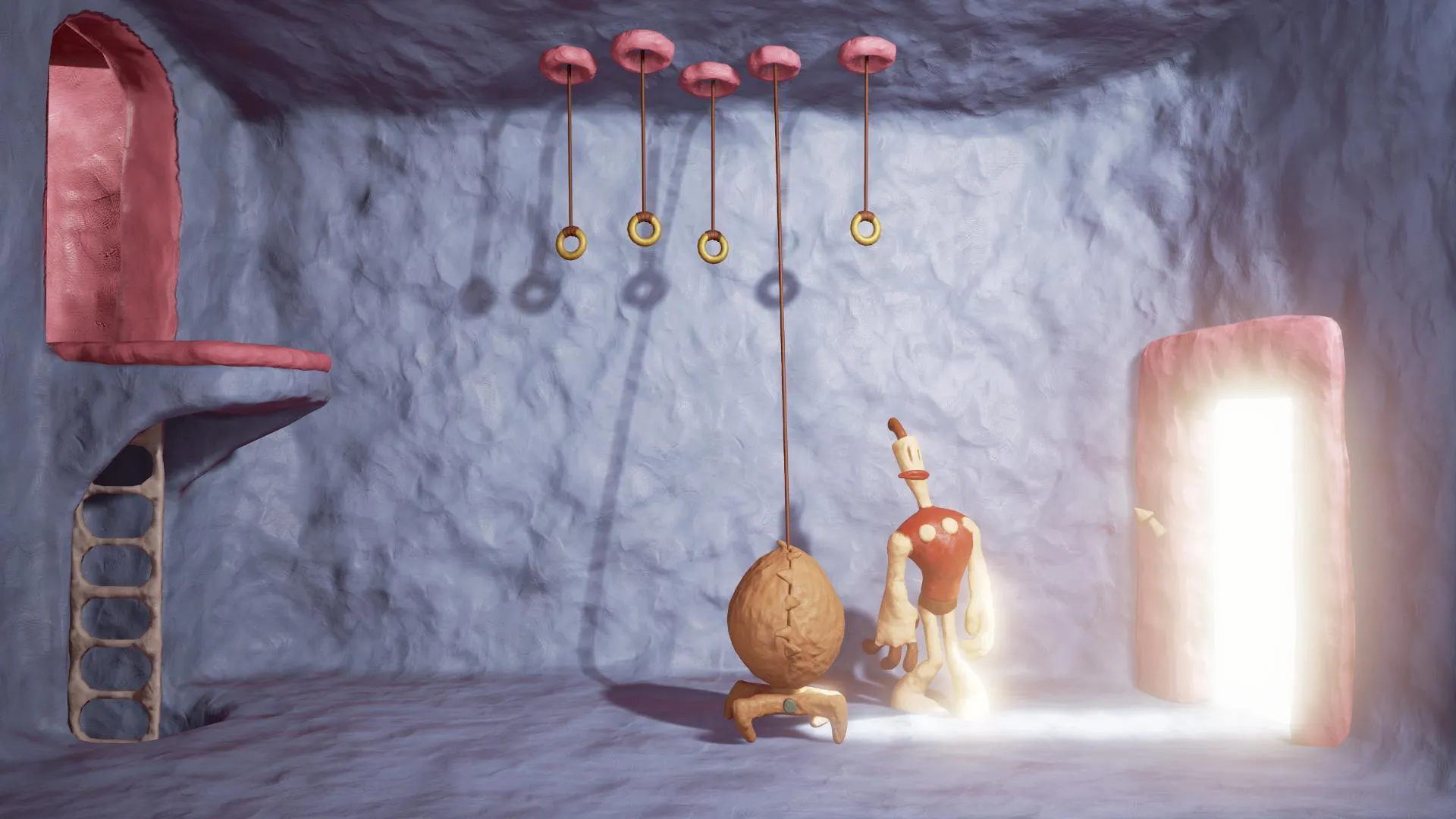 Captura The Neverhood – Escena Con Personaje De Plastilina En Cueva Iluminada Por Una Puerta