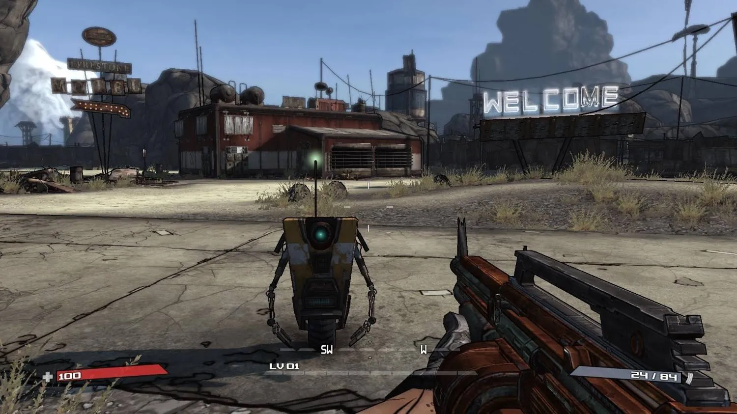 Captura Borderlands Game Of The Year Edition – Entrada Al Pueblo Con El Letrero Welcome Y Claptrap Al Frente