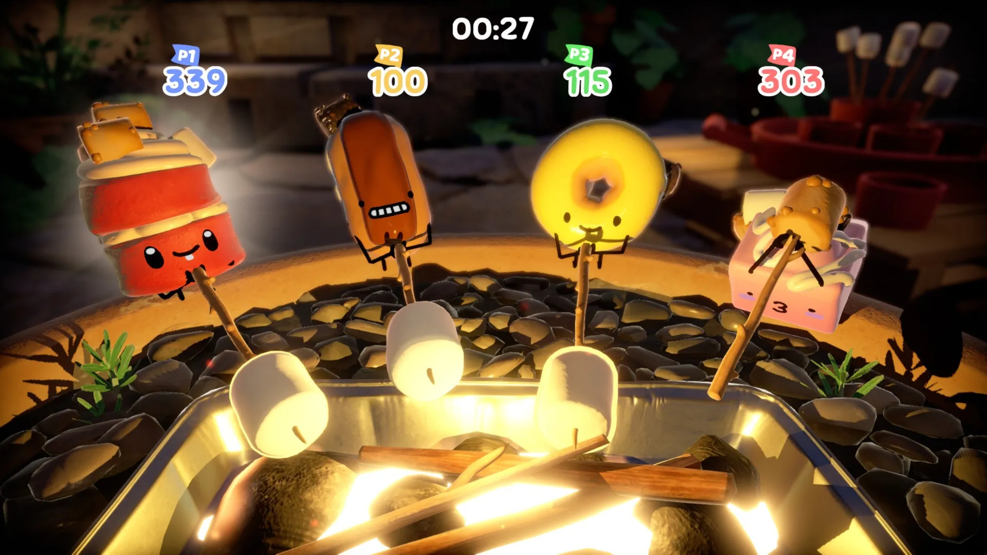 Captura Cake Bash Varias Figuras De Reposteria Compiten Junto A Una Fogata Con Puntajes Flotando