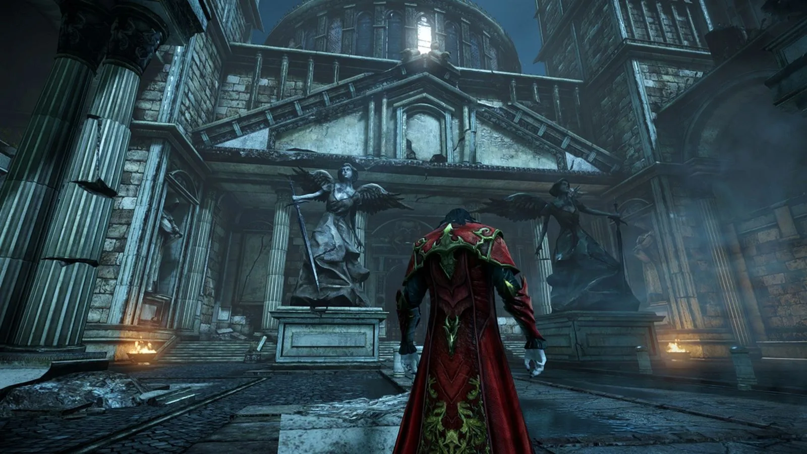 Captura Castlevania Lords Of Shadow 2 – El Protagonista De Espaldas En Un Pasillo Gotico Iluminado Por Faroles
