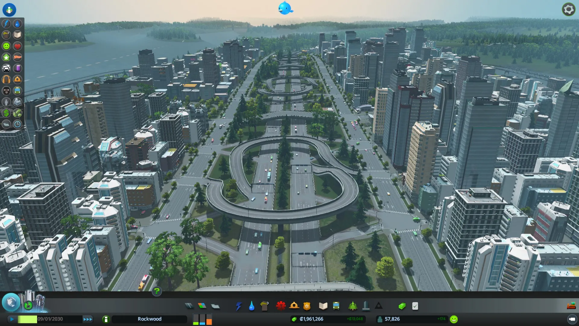 Captura Cities Skylines Deluxe Edition – Vista Aerea De Una Ciudad Con Rotonda Central Y Edificios Altos