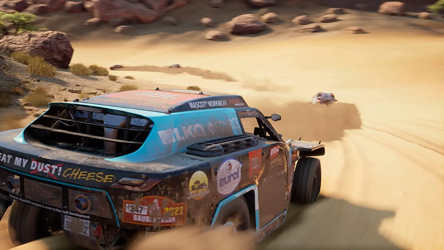 Captura Dakar Desert Rally Camioneta Azul Con Calcomanias Avanza Por Un Desierto Con Rocas