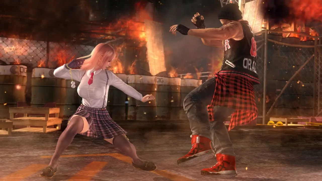 Captura Dead Or Alive 5 Last Round Pelea En Una Arena Nocturna Con Fuego De Fondo