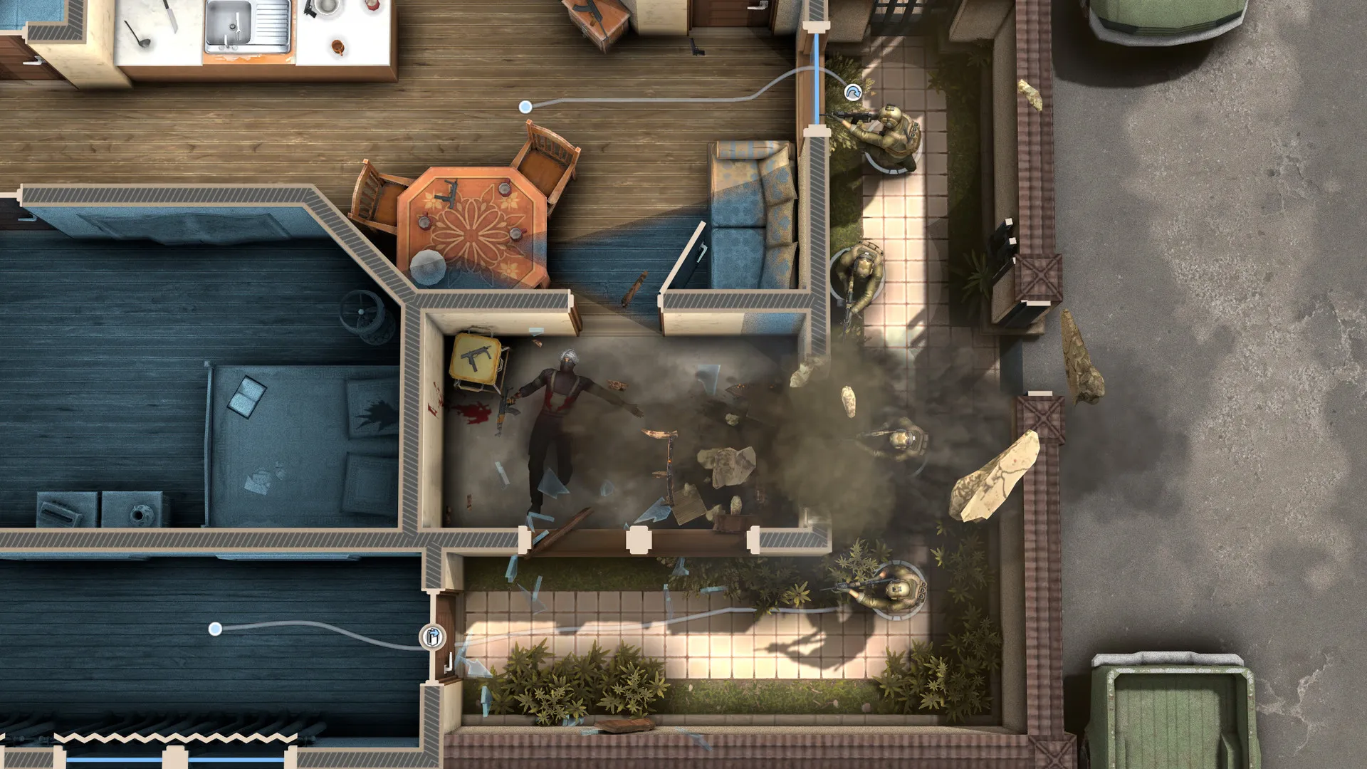 Captura Door Kickers 2 – Vista Cenital De Una Casa Con Explosiones Y Rutas Tacticas Marcadas