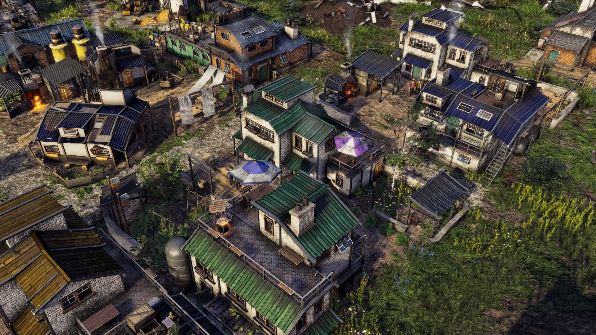 Captura Endzone 2 Vista Aerea De Una Aldea Con Edificios Verdes Entre Ruinas
