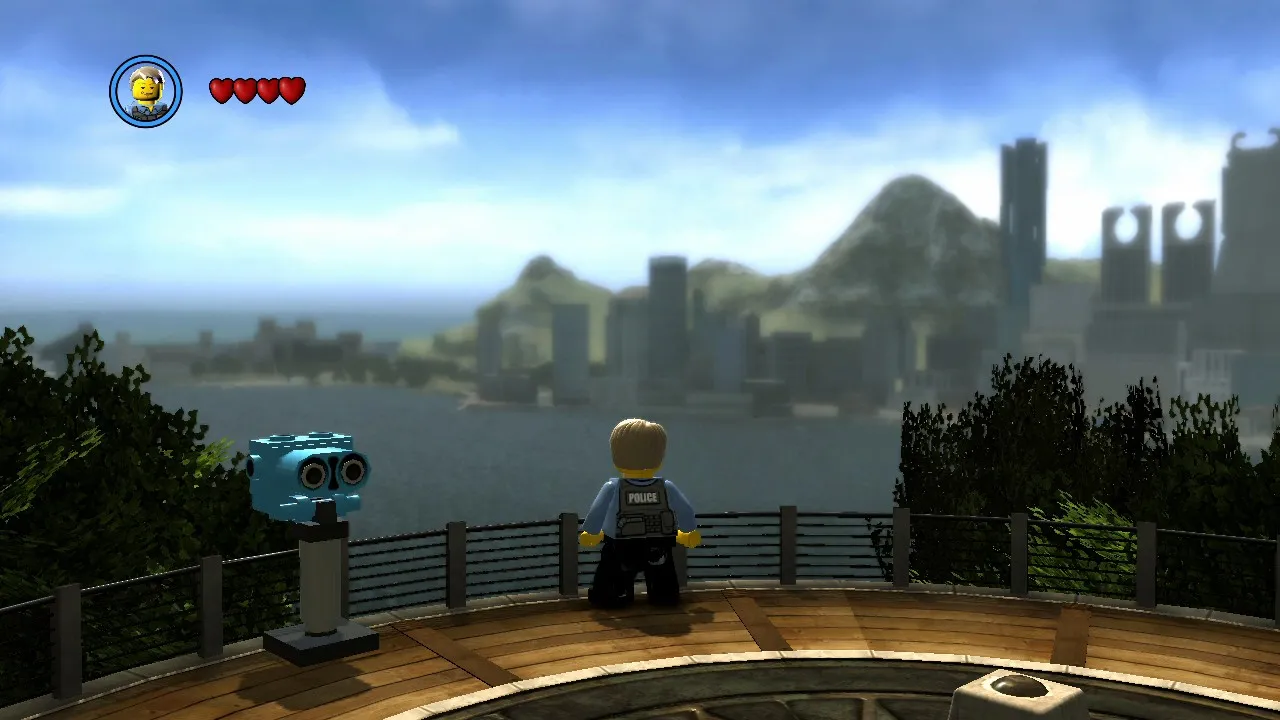 Captura LEGO City Undercover – Vista Desde Una Azotea Con El Personaje Mirando La Ciudad Al Atardecer