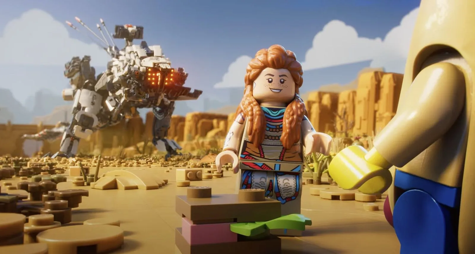 Captura LEGO Horizon Adventures Escena De Dialogo Entre Dos Personajes En Terreno Rocoso