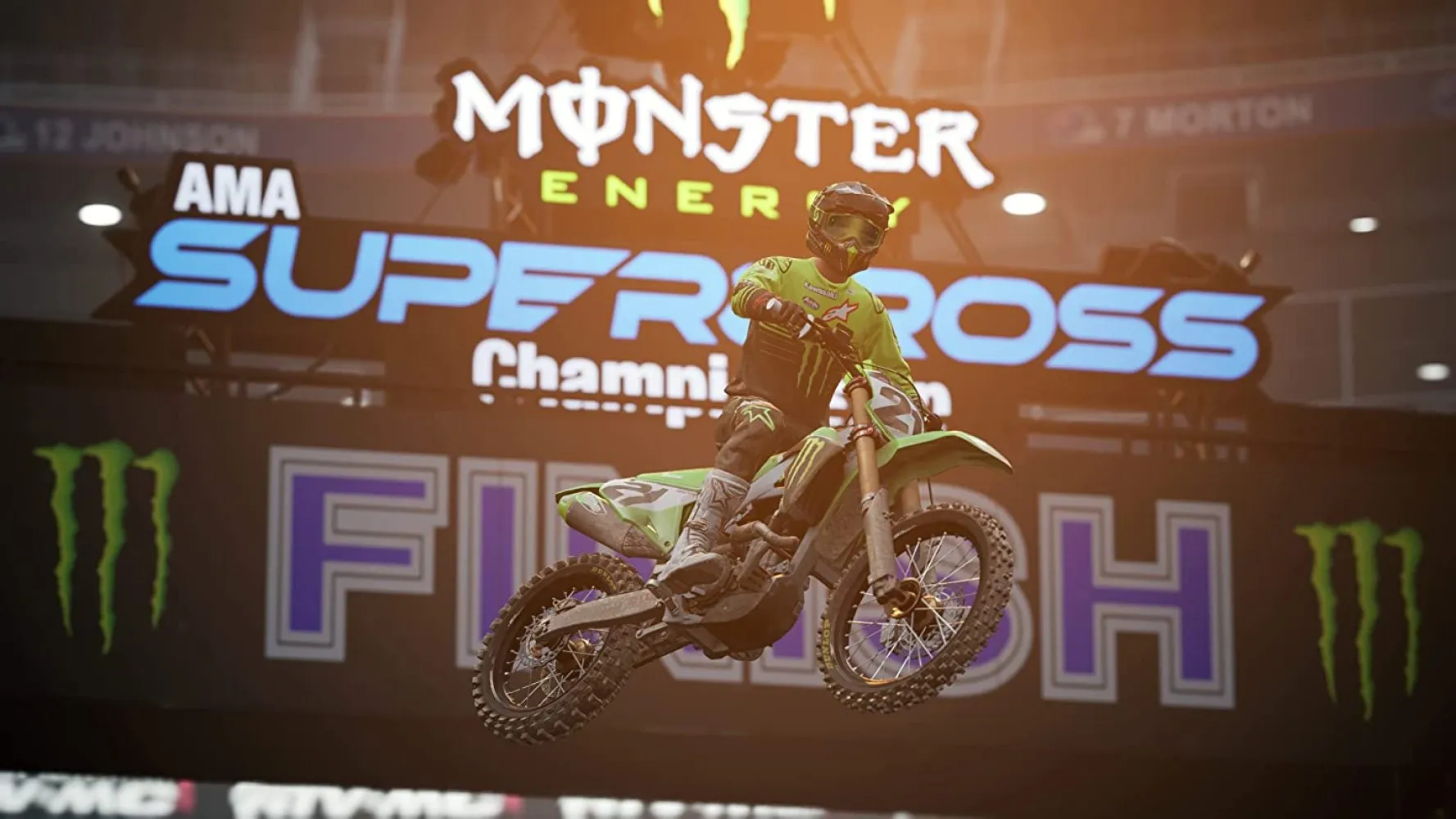 Captura Monster Energy Supercross 6 Motociclista Realiza Acrobacia Bajo Focos Intensos Del Estadio