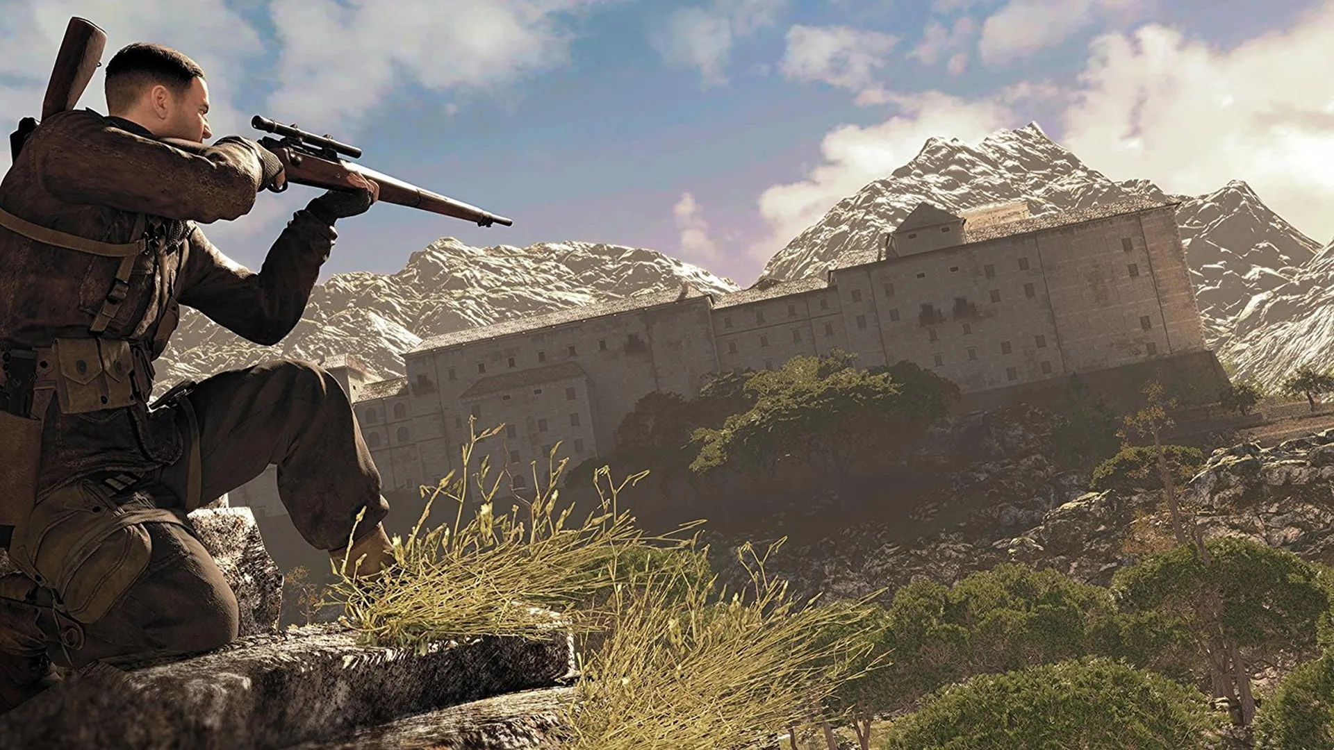 Captura Sniper Elite 4 Soldado Arrodillado En Paisaje Montanoso Con Fusil Listo Para Disparar