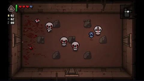 Captura The Binding Of Isaac – Combate Dentro De Una Sala Con Calaveras Flotantes Y Rocas