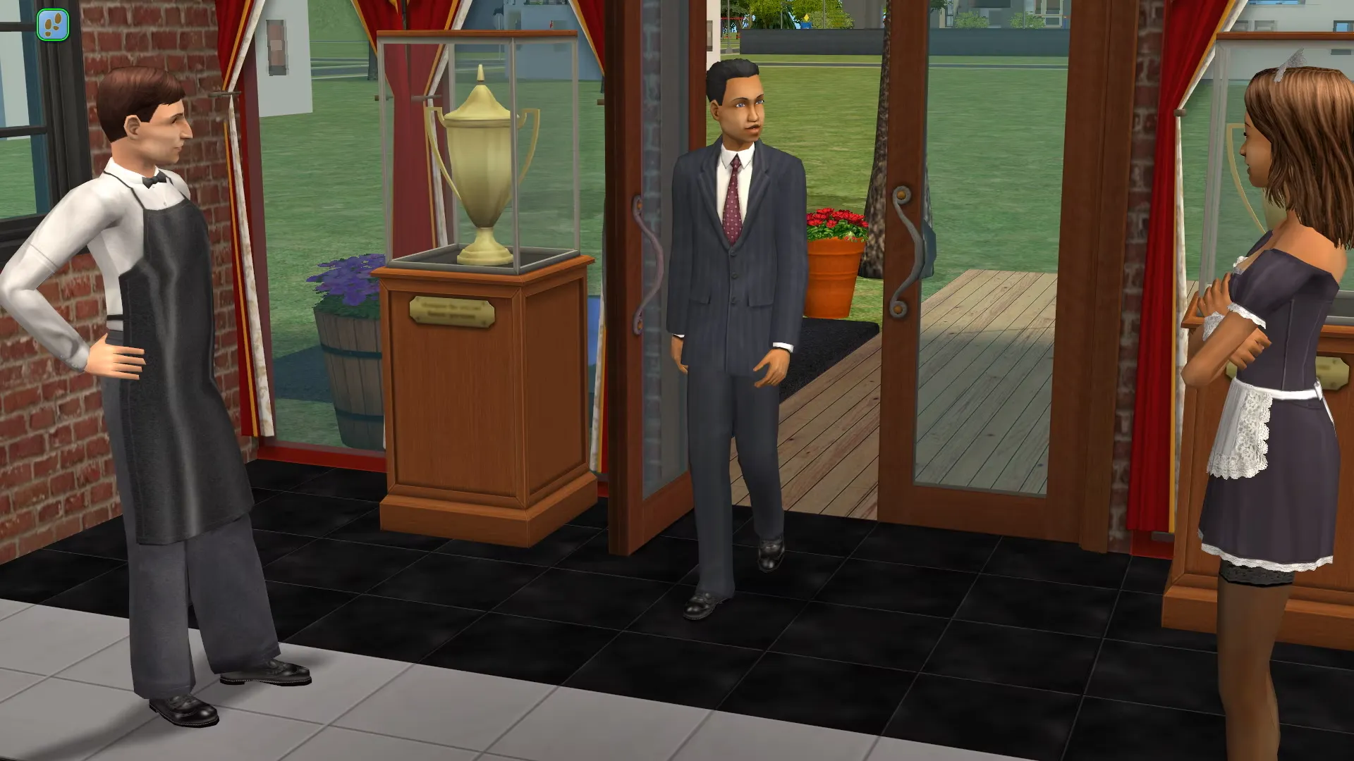Captura The Sims 2 Dos Adultos Conversan En La Entrada De Una Casa Con Trofeos En Exhibicion