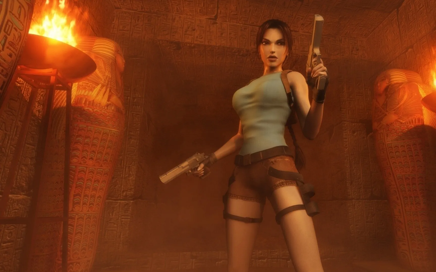 Captura Tomb Raider Anniversary – Lara Croft Apunta Con Su Pistola En Una Camara Iluminada Por Antorchas