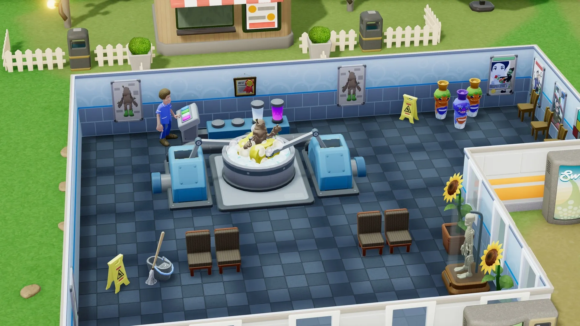 Captura Two Point Hospital Sala De Espera Con Recepcionista Y Decoracion Alegre